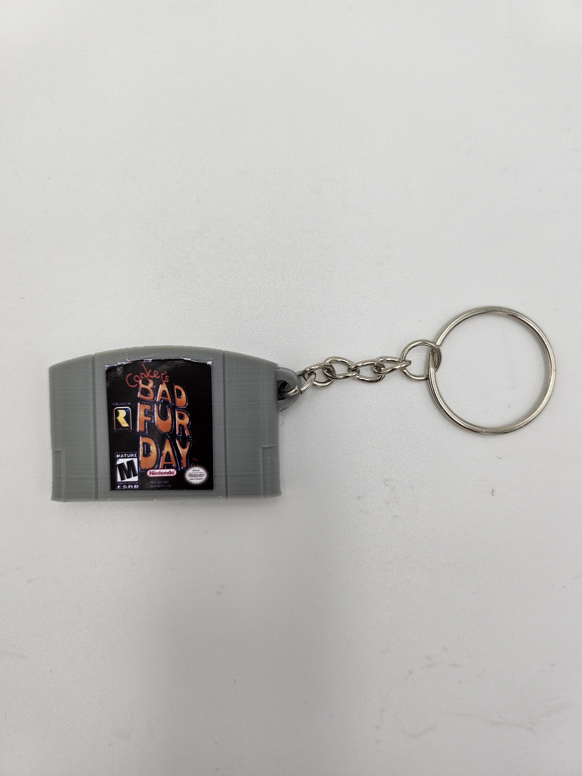 LLAVERO CARTUCHO VIDEOJUEGO NINTENDO 64 - 12