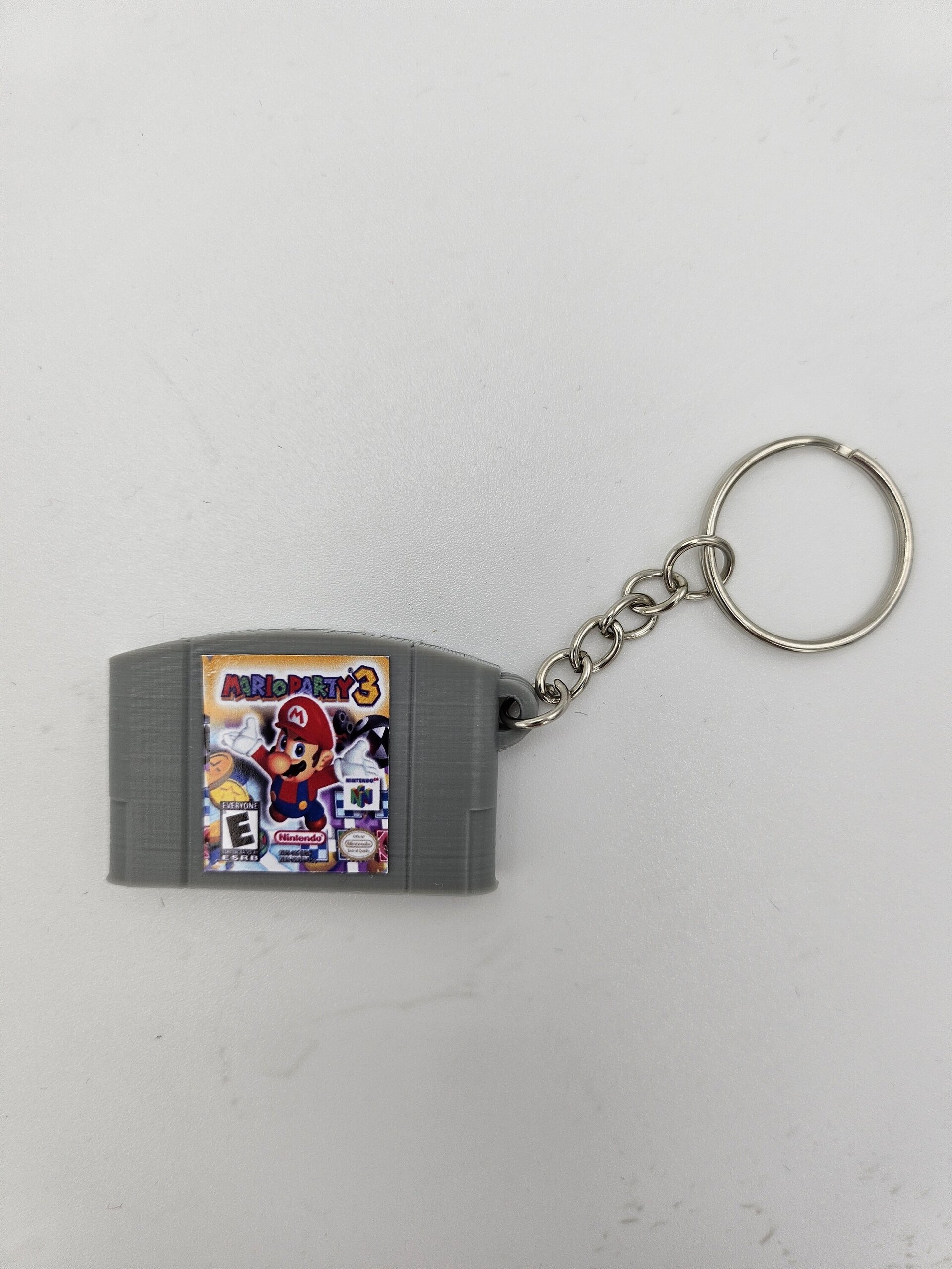 LLAVERO CARTUCHO VIDEOJUEGO NINTENDO 64 - 14