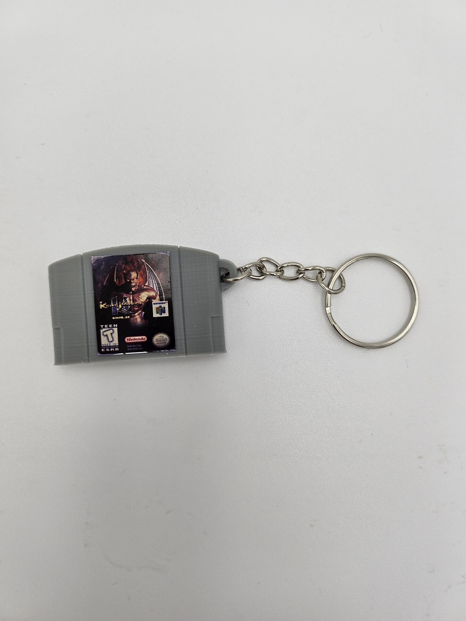 LLAVERO CARTUCHO VIDEOJUEGO NINTENDO 64 - 11