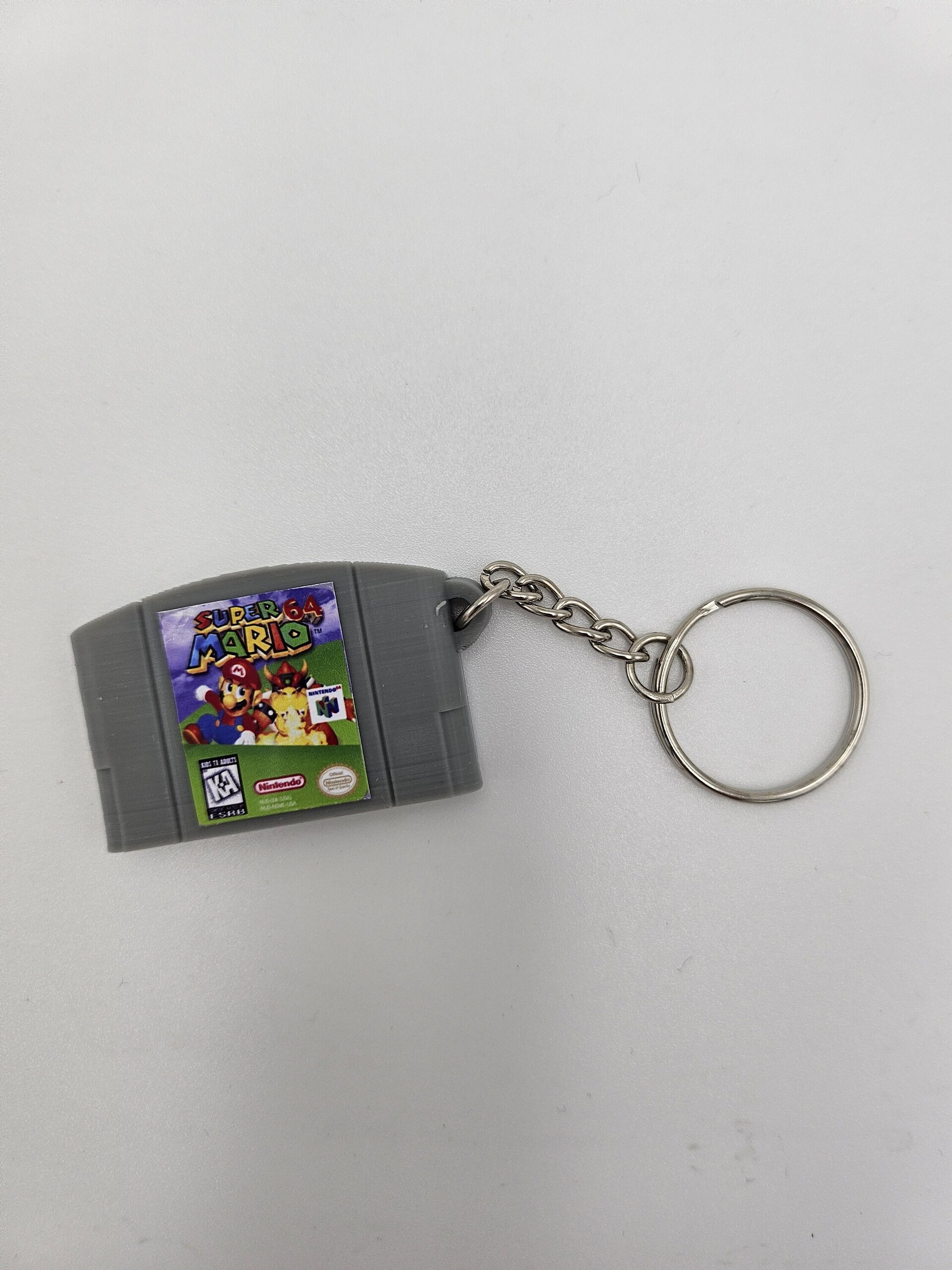 LLAVERO CARTUCHO VIDEOJUEGO NINTENDO 64 - 7